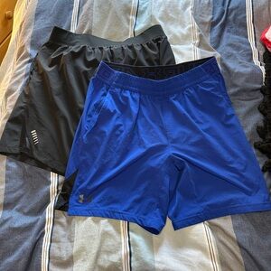2 pairs Under Armour shorts Blue (HeatGear) and Black (SpeedPocket) Large. EUC
